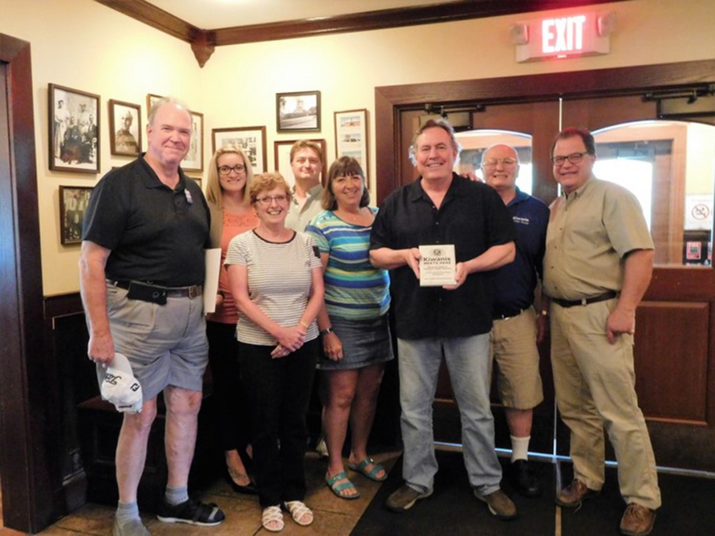 Flaherty receives plaque from HF-M Kiwanis