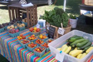 Fresh local produce is available at Mendon Farmers Market. See article at right. Photo by Josh Alcorn